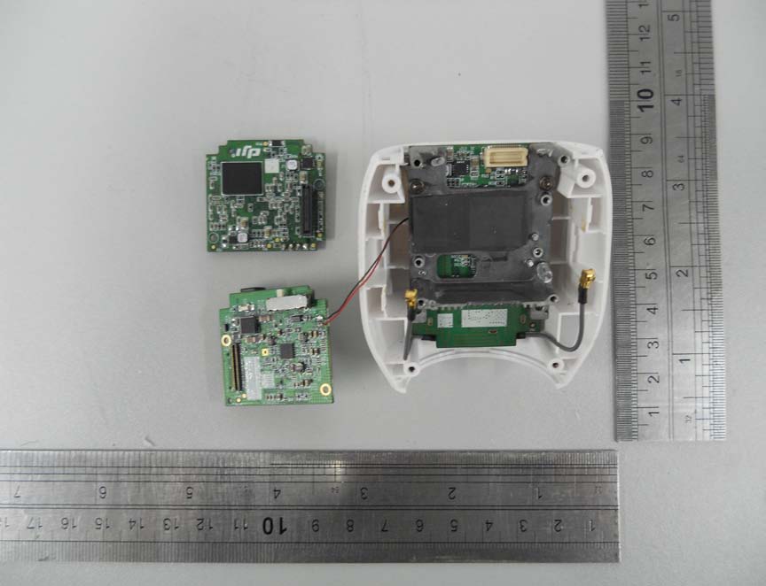 Multiple PCBs with SoC, RF transceivers, and shielded antenna connections