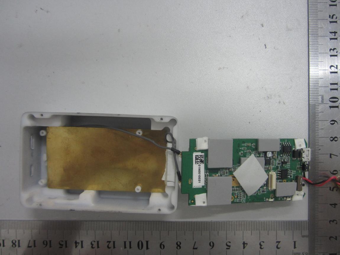 Main PCB with SoC and RF Shielding.
