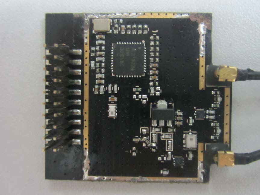 Main IC with Crystal Oscillator and Pin Headers.