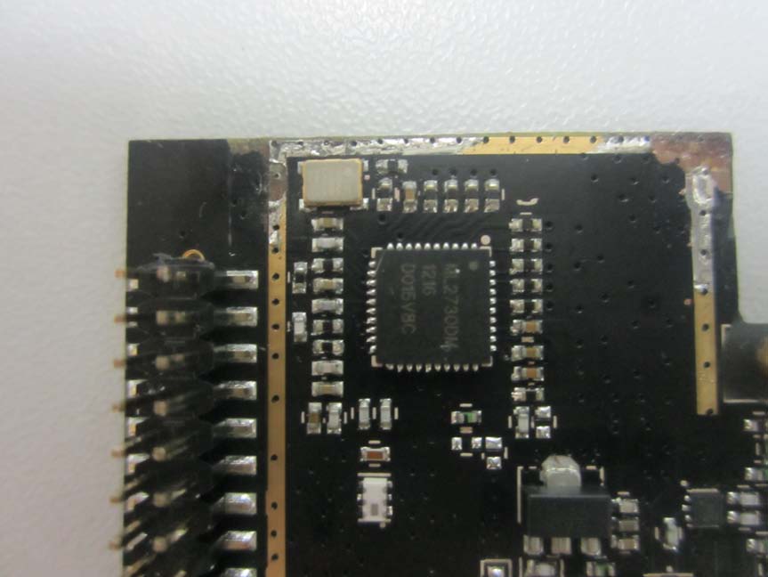 Prominent IC with QFP Package and Crystal Oscillator.