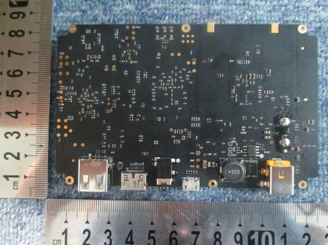 Underside of PCB with data and power connectors.