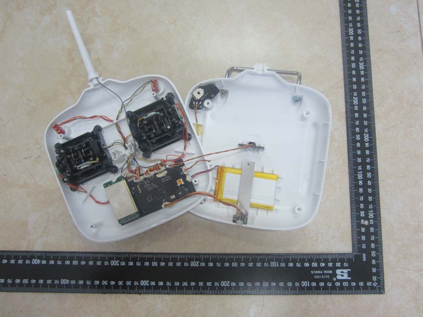 Main PCB with RF shielding and external antenna.
