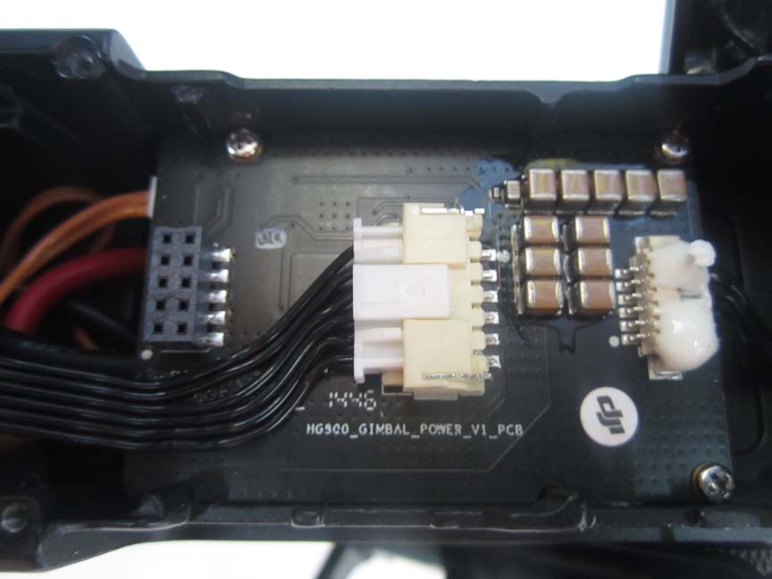 Power distribution PCB with robust connectors and voltage stabilization capacitors.