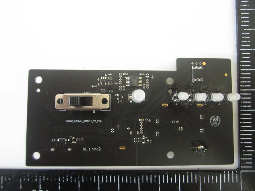 User interface PCB featuring status LEDs and control switches.