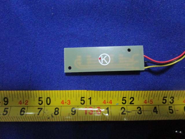 Rectangular PCB antenna or compass module with meandered trace.