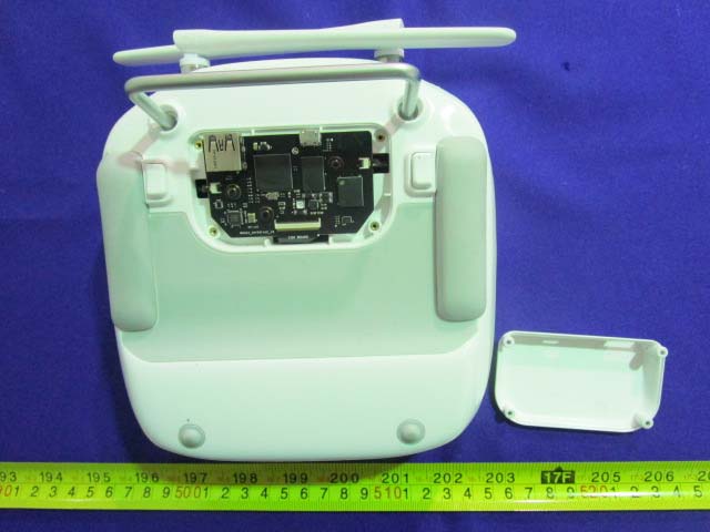 Remote controller PCB with dual external antennas and key RF components.