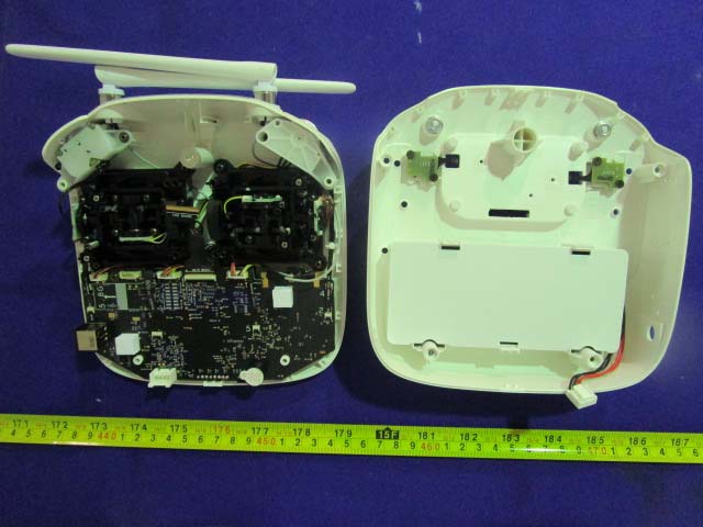 Controller PCB with gimbal assemblies, antennas, and modular connectors.