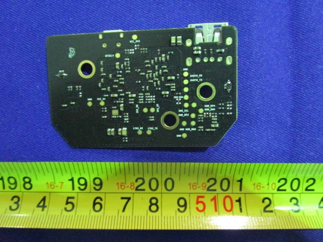 Unpopulated PCB showing footprints for ICs, connectors, and power components.