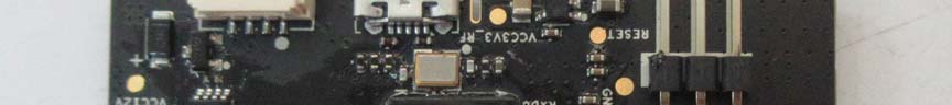 PCB section with voltage regulators, power filtering, and RESET switch.