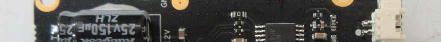 Power management section with large capacitor and JST connector.