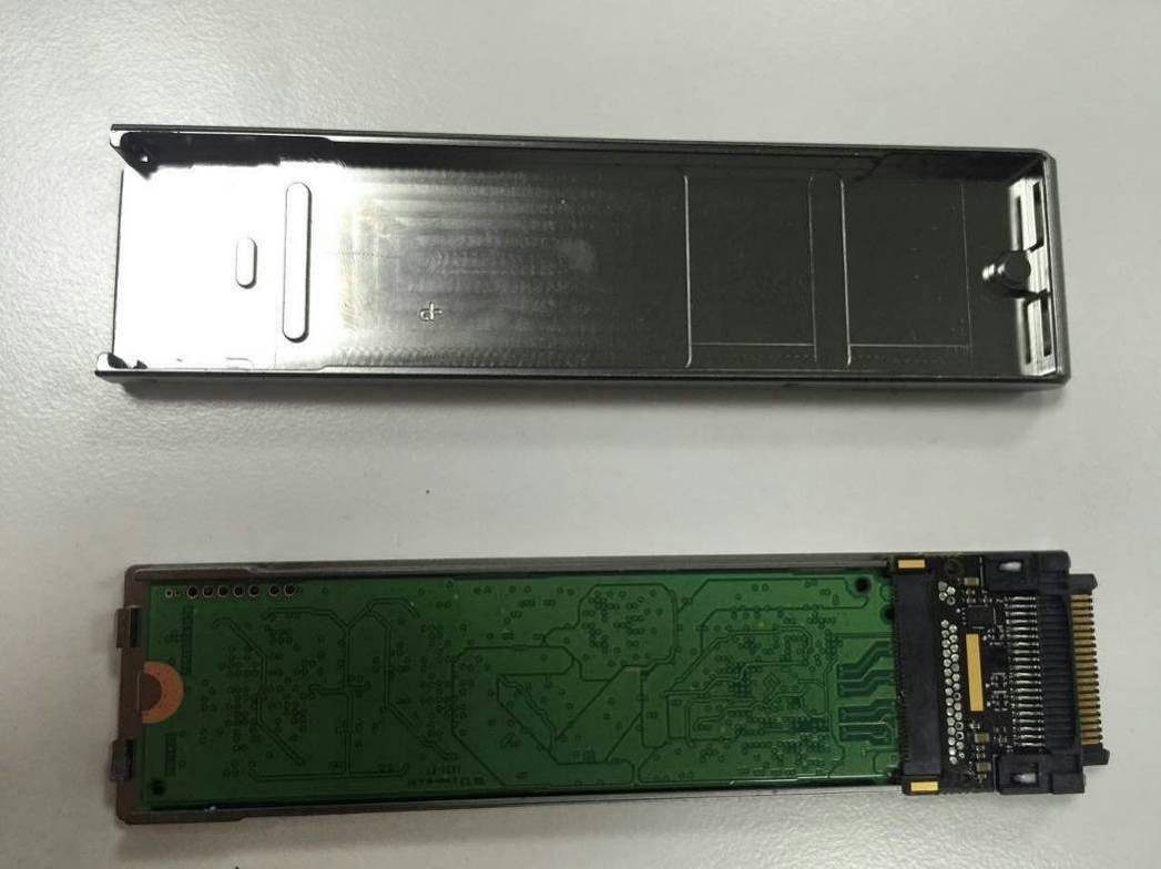 Bottom PCB view showing connector interface and dense trace routing.