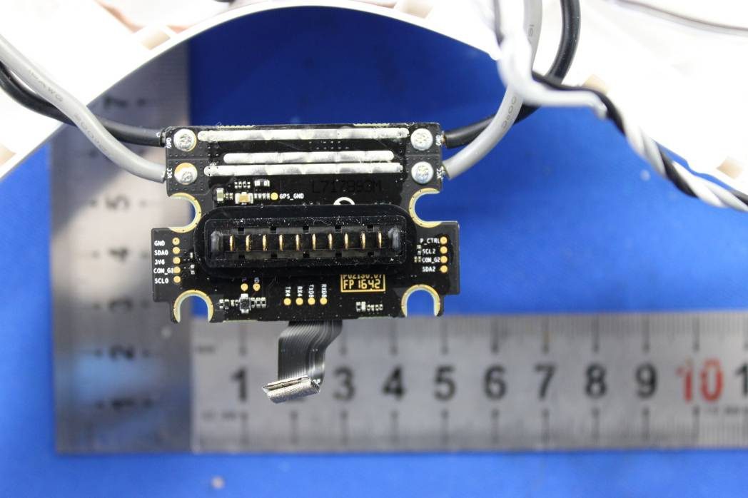 Interface PCB with multi-pin connectors and labeled signal lines.