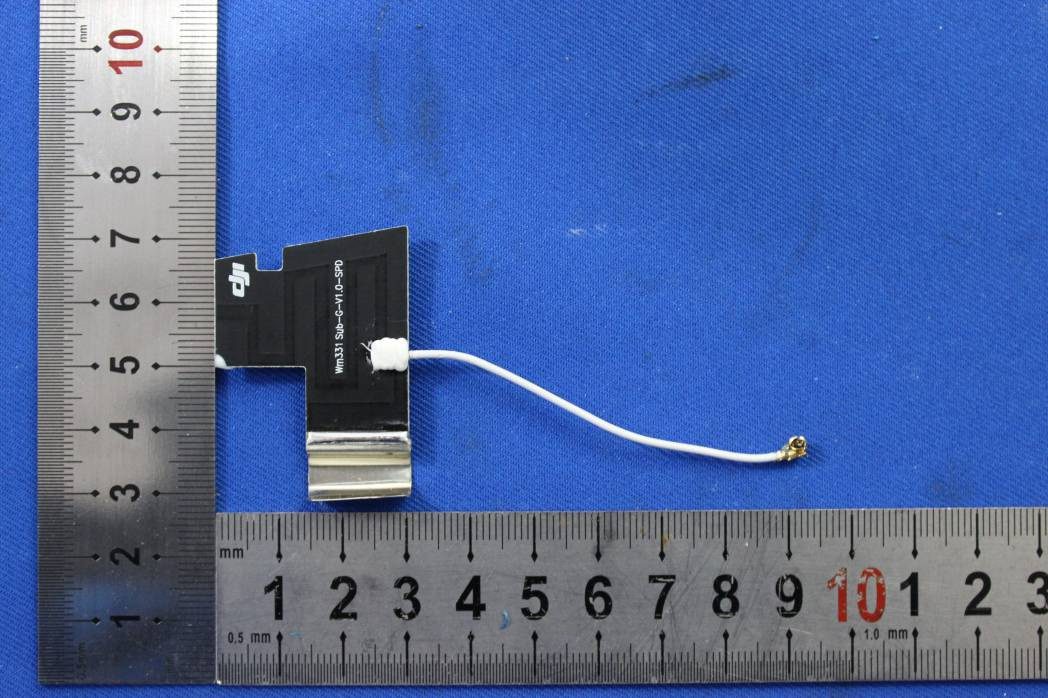 Compact PCB trace antenna with U.FL connector and ground plane.