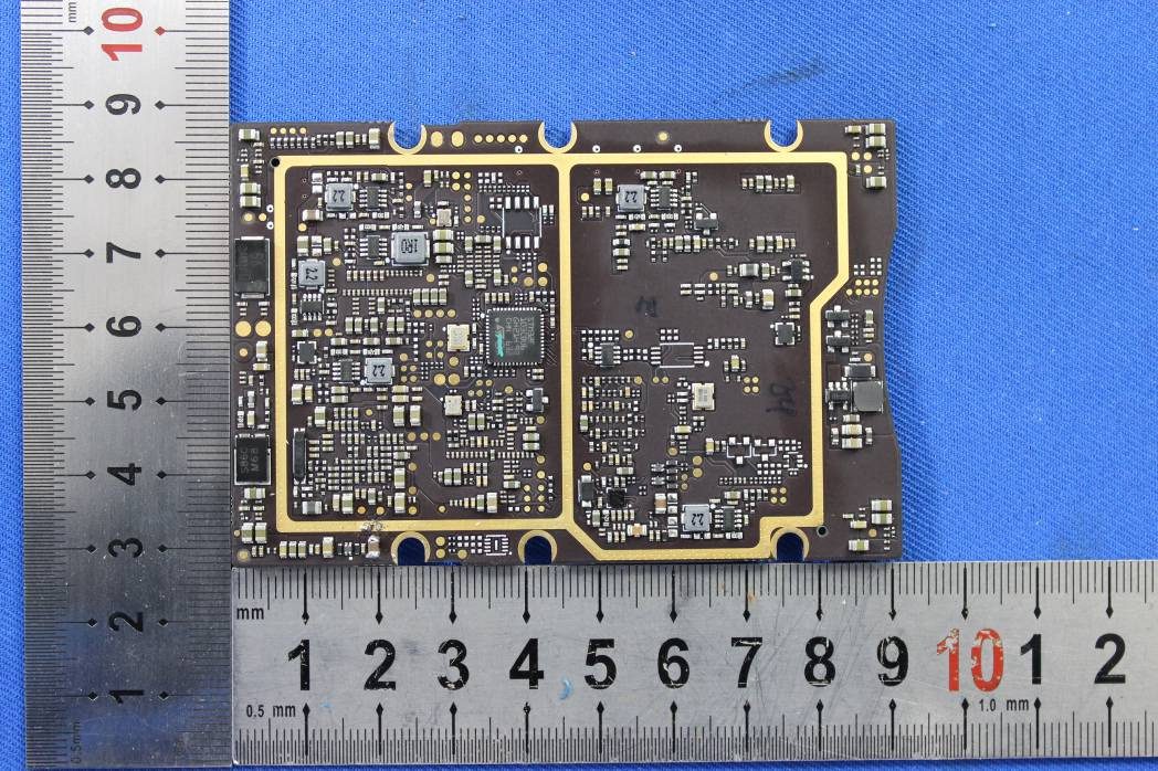 Multi-layer PCB with central controller and EMI shielding.