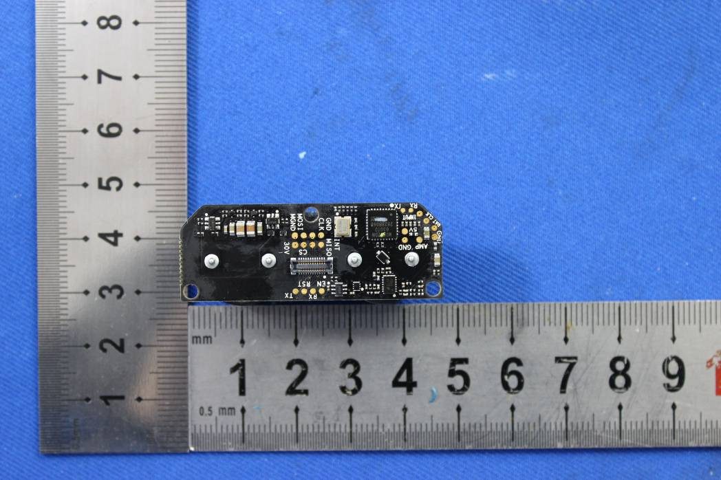 Densely populated PCB with test points and debug interfaces.
