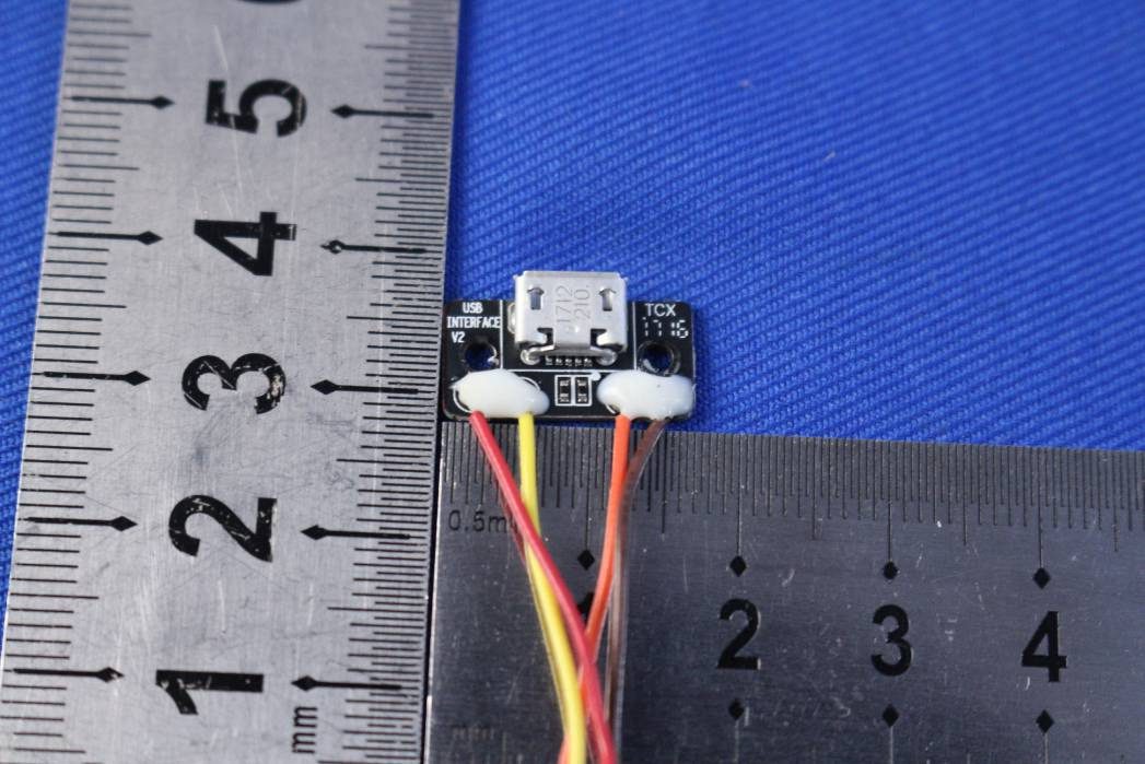 USB interface board with micro-USB connector for maintenance and firmware updates.
