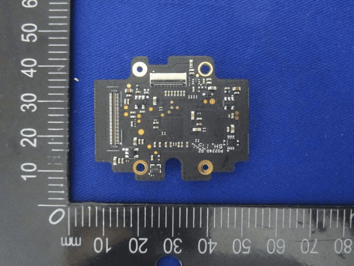 Small interface PCB with fine-pitch connectors and test points for signal integrity.