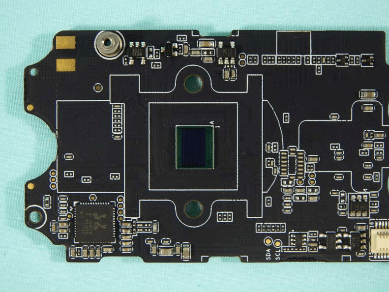 Main PCB with image sensor, SoC, and advanced power management.