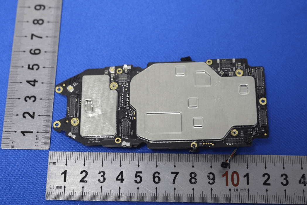 EMI-shielded PCB for RF and main processing functions.