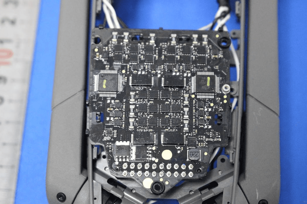 Densely populated ESC/control board with multiple QFP ICs and MOSFET arrays.