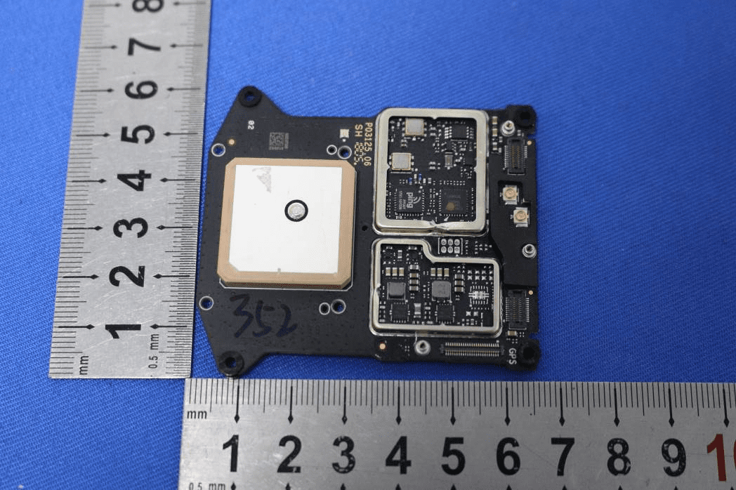 GNSS/navigation PCB with ceramic patch antenna and shielded RF sections.