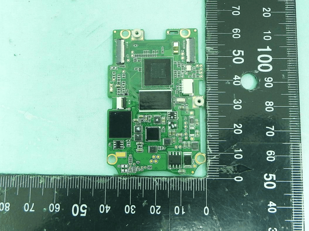Main board with SoC, memory, power management, and antenna connectors.