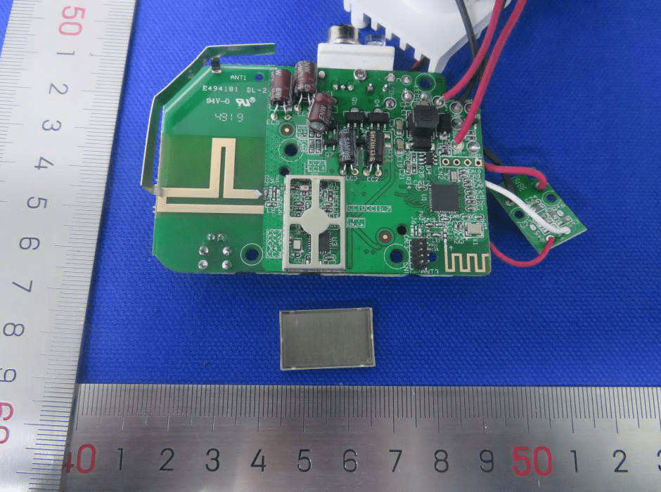 PCB with RF section, main controller, and exposed trace antennas.