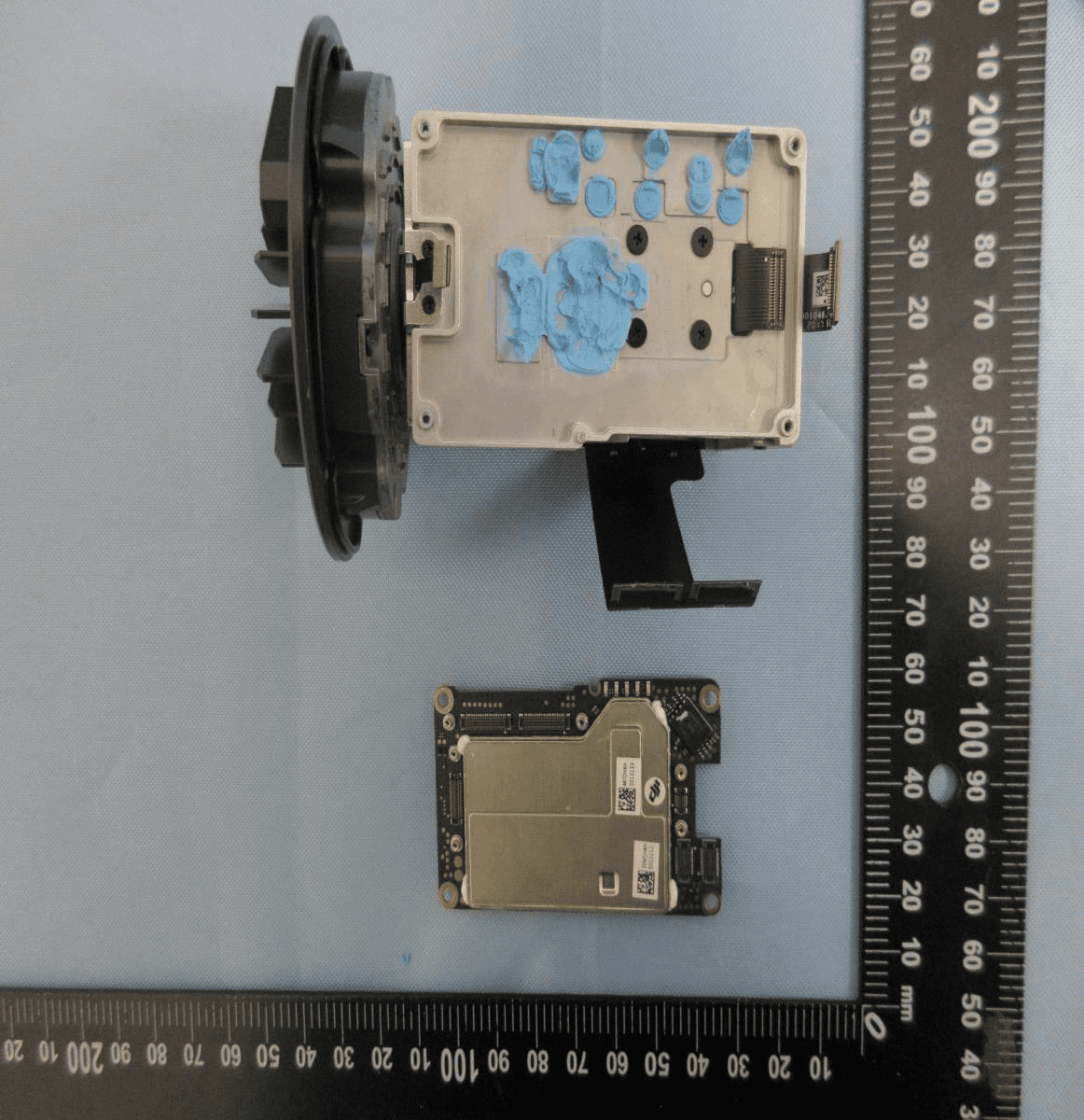 Shielded PCB module with thermal management for RF and processing circuits.