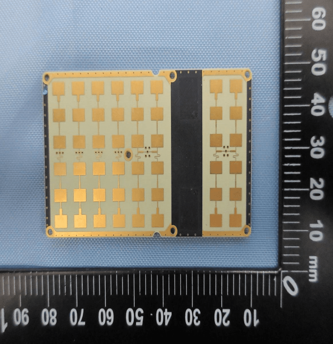Phased array PCB with gold-plated patch antennas for advanced RF applications.