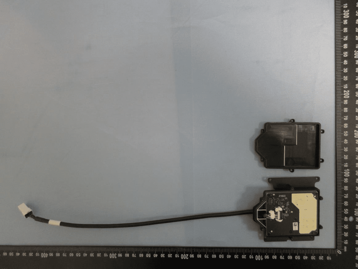 Main PCB with integrated patch antenna and central radar SoC.