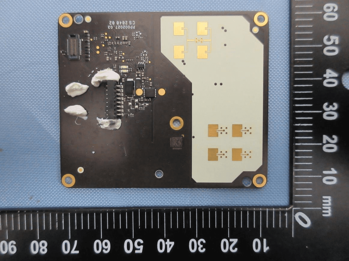PCB with planar antenna array and main signal processing IC.