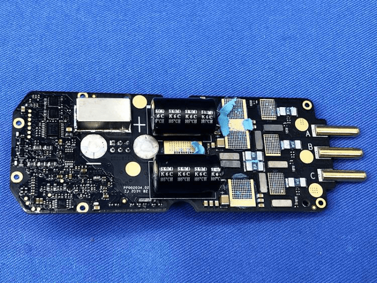 High-current ESC PCB with shielded control ICs and robust power filtering.