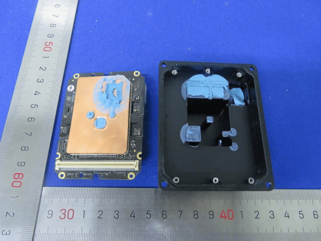 PCB with copper heat spreader and large modular connector for thermal and EMI control.