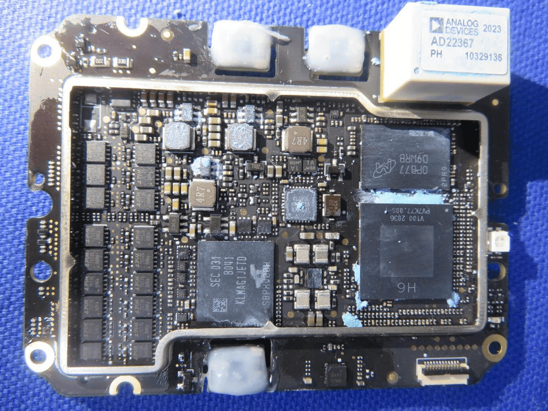 Main flight controller PCB with high-integration MCU, NAND flash, and shielded analog front-end.