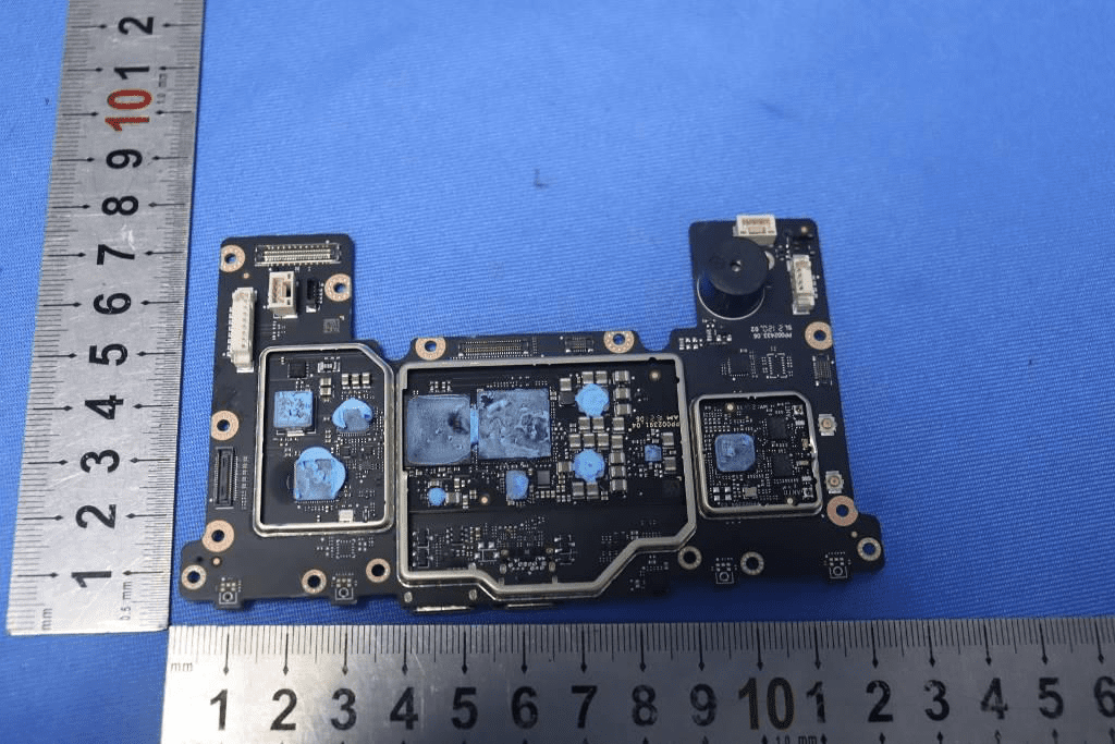 High-density PCB with shielded processor and modular interface connectors.