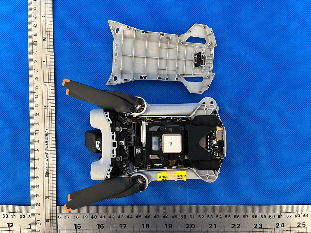 Integrated flight controller with GNSS module and shielded RF section.