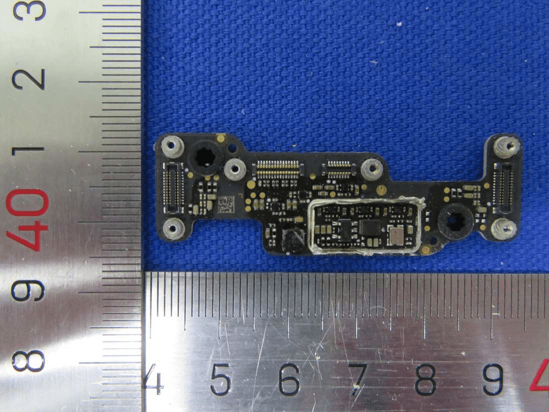 Miniaturized high-density PCB with shielded IC, connectors, and robust test points.