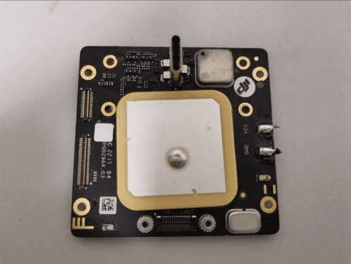 GNSS receiver PCB with ceramic patch antenna and RF shielding.