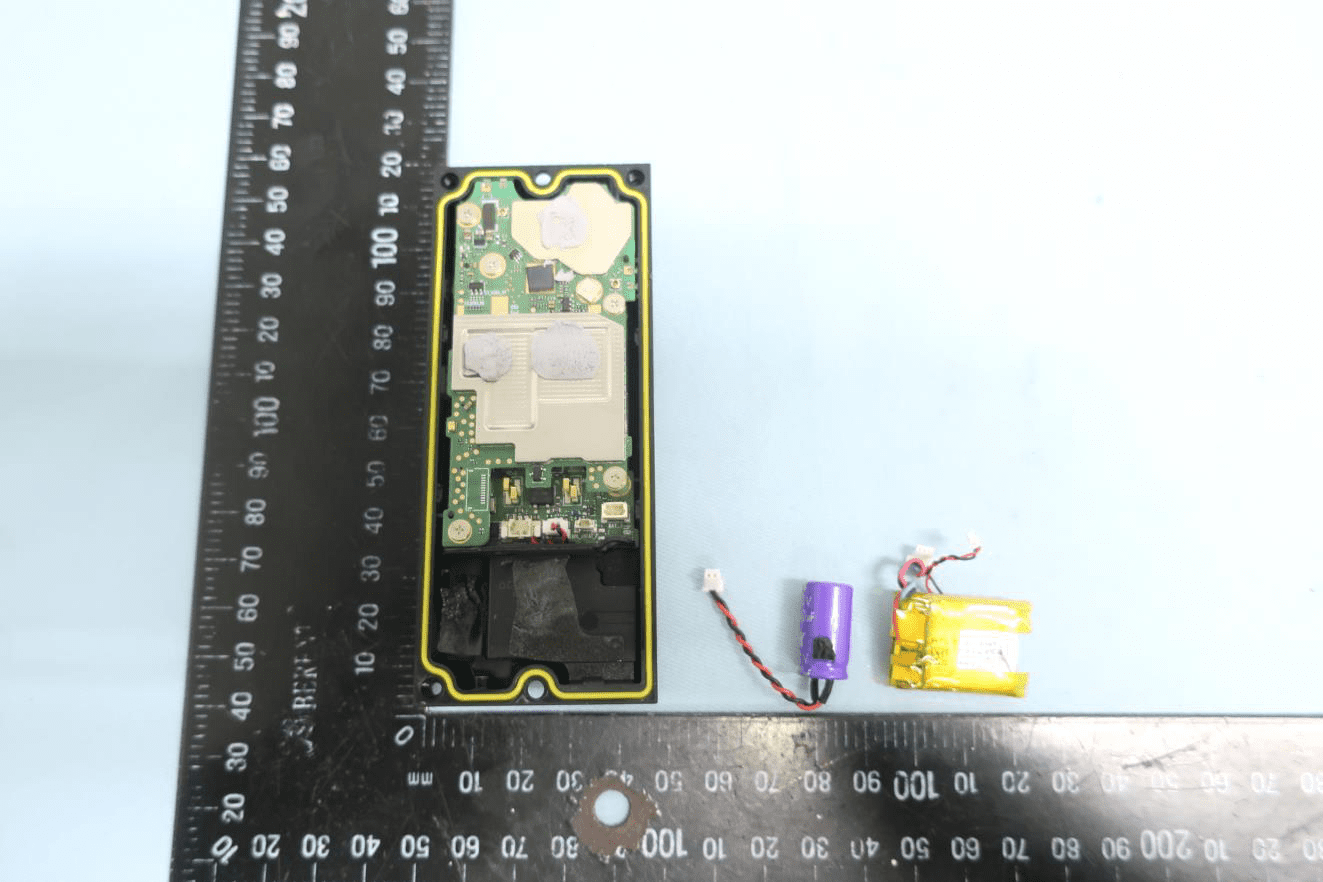 Main PCB with dual battery types, EMI shielding, and integrated antennas.