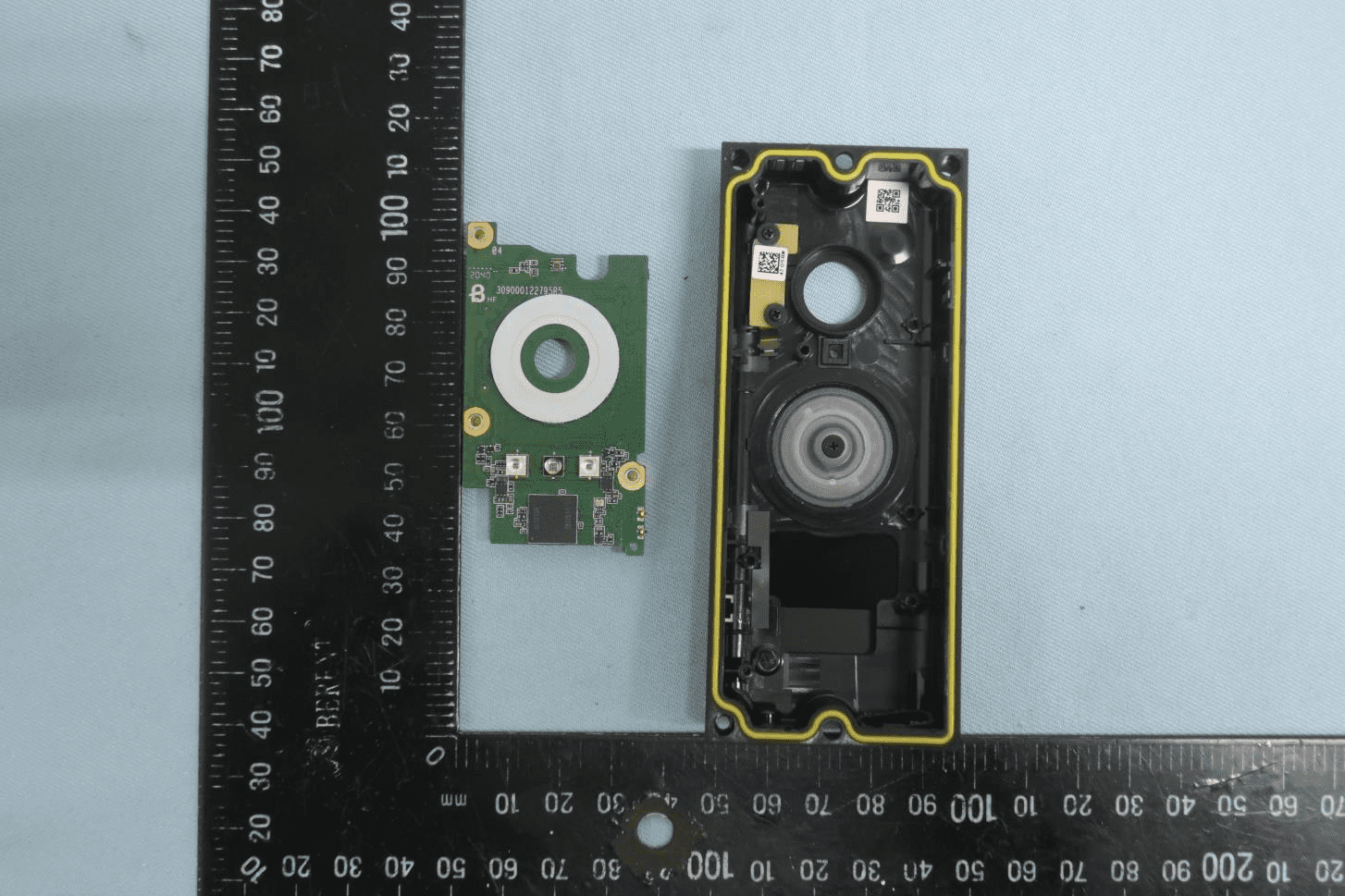 Camera/sensor PCB with tactile switches and weatherproof front housing.